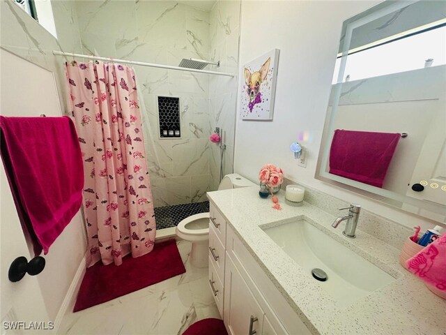 3713 25th St SW, Lehigh Acres, FL 33976 - full bathroom with marble finish floor, vanity, toilet, and a stall shower