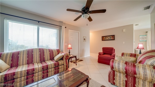 tiled living room featuring ceiling fan