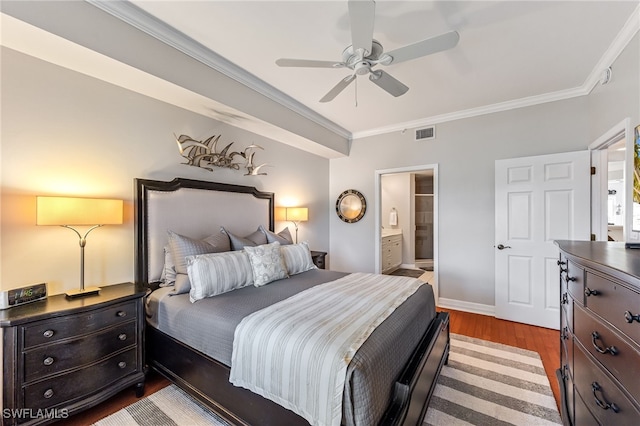 bedroom with ornamental molding, ensuite bathroom, ceiling fan, and dark hardwood / wood-style floors