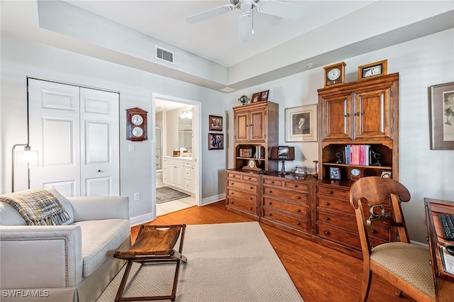 interior space featuring light wood-type flooring and ceiling fan