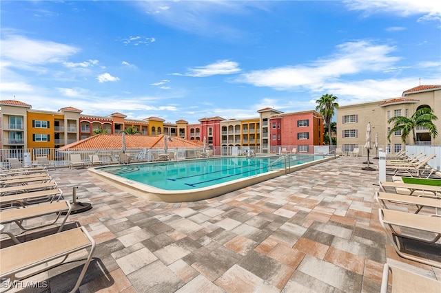 view of swimming pool featuring a patio area