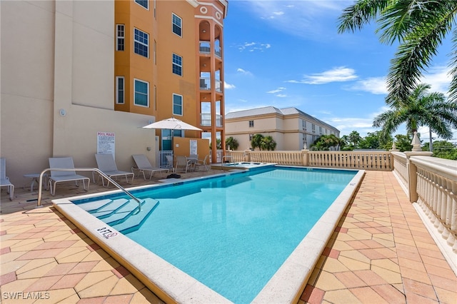 view of pool featuring a patio area