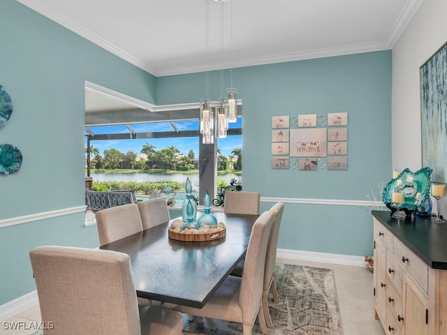 14748 Windward Ln, Naples, FL 34114 - dining space featuring crown molding, an inviting chandelier, baseboards, and light tile patterned floors