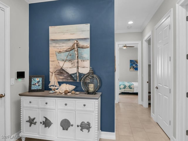 14748 Windward Ln, Naples, FL 34114 - hallway featuring light tile patterned floors, baseboards, and ornamental molding