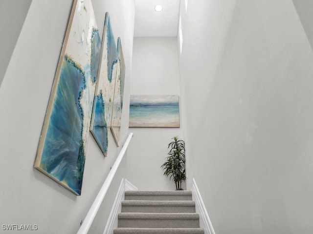 14748 Windward Ln, Naples, FL 34114 - stairway with baseboards and recessed lighting