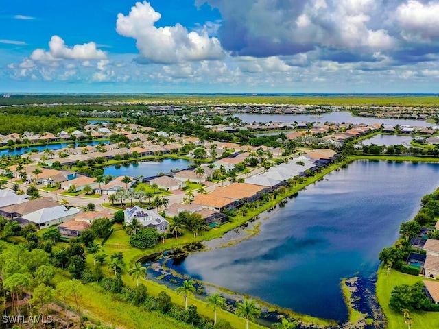 drone / aerial view featuring a water view