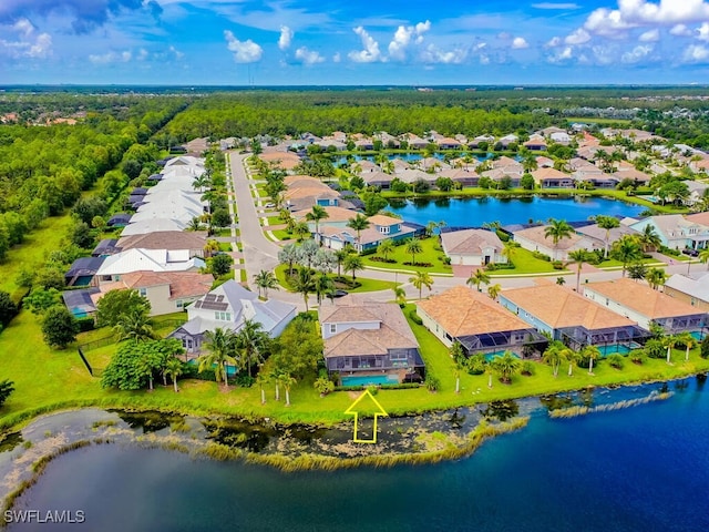 drone / aerial view with a water view