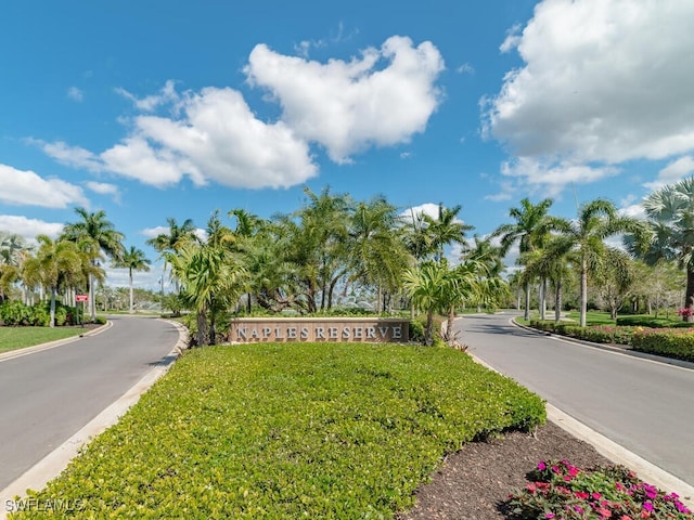 14748 Windward Ln, Naples, FL 34114 - community / neighborhood sign with a yard