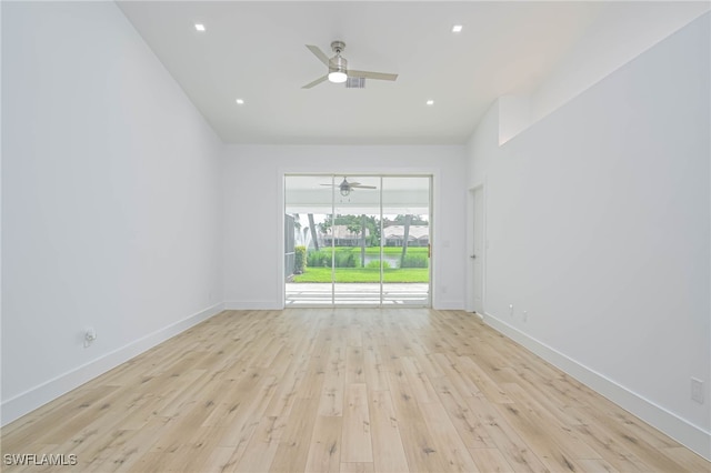 unfurnished room with ceiling fan and light hardwood / wood-style floors