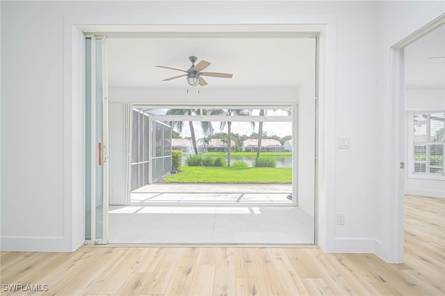 interior space with light hardwood / wood-style flooring and ceiling fan