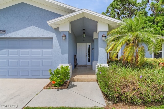 entrance to property with a garage