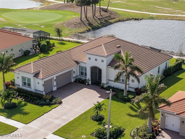 birds eye view of property with a water view