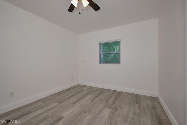 unfurnished room with ceiling fan and light hardwood / wood-style flooring