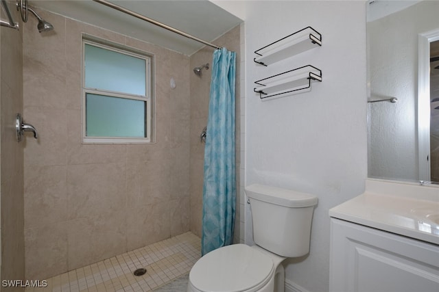 bathroom with walk in shower, vanity, and toilet