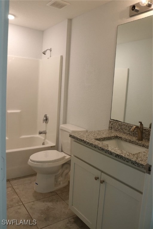 full bathroom with tile patterned flooring, vanity, toilet, and shower / bathtub combination