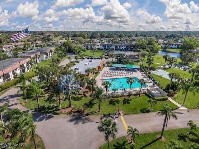 birds eye view of property featuring a water view