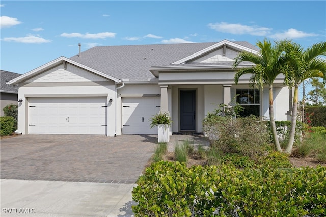 view of front of home with a garage