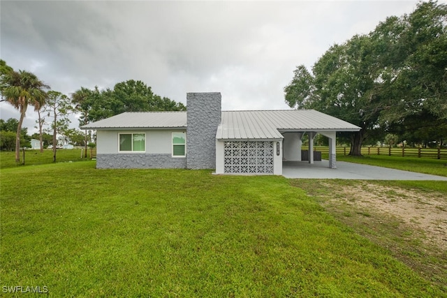 exterior space featuring a lawn