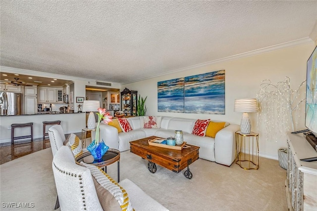 carpeted living room featuring crown molding and a textured ceiling