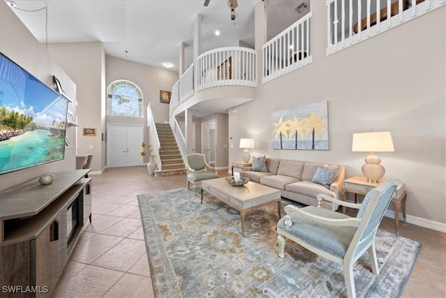 living room with a high ceiling