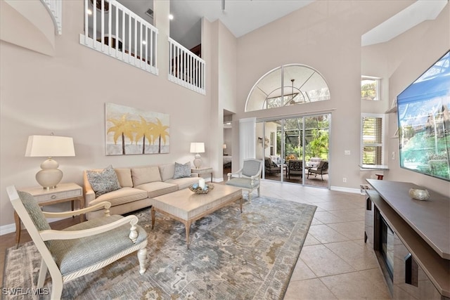 living room with a high ceiling