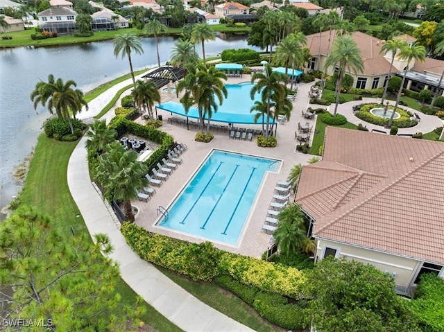 birds eye view of property featuring a water view