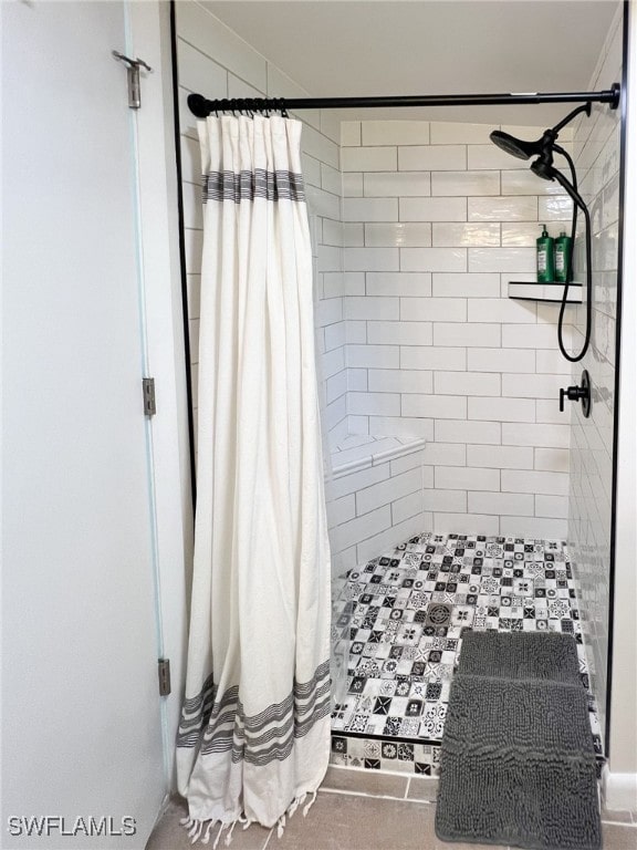 bathroom with a shower with shower curtain