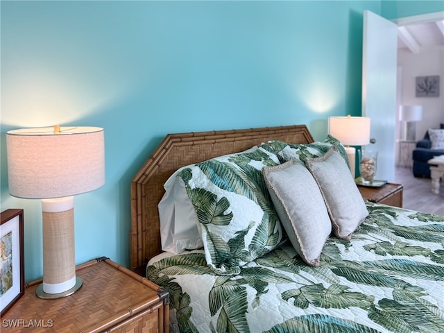 bedroom featuring wood-type flooring