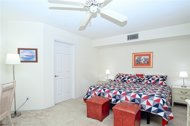 bedroom featuring light carpet and ceiling fan