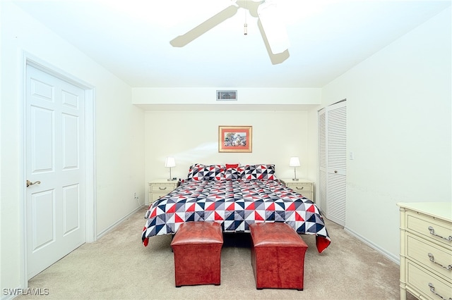 bedroom with light colored carpet and ceiling fan