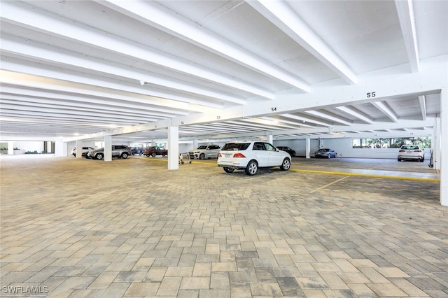 garage featuring a carport