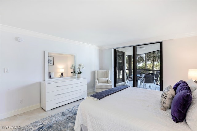 bedroom featuring crown molding and access to outside