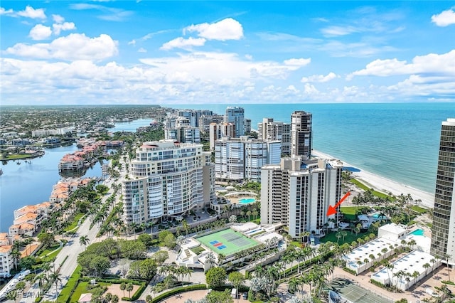 drone / aerial view with a view of the beach and a water view