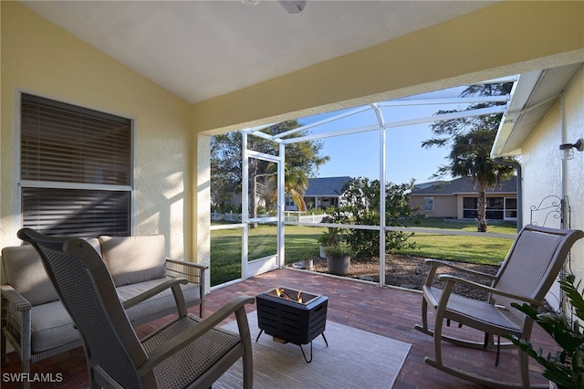 sunroom with vaulted ceiling