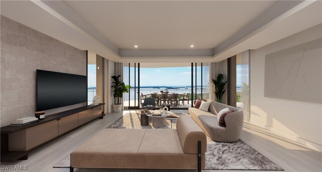 living room featuring recessed lighting, a wall of windows, an accent wall, and light wood-style floors