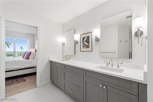 bathroom featuring hardwood / wood-style flooring and vanity