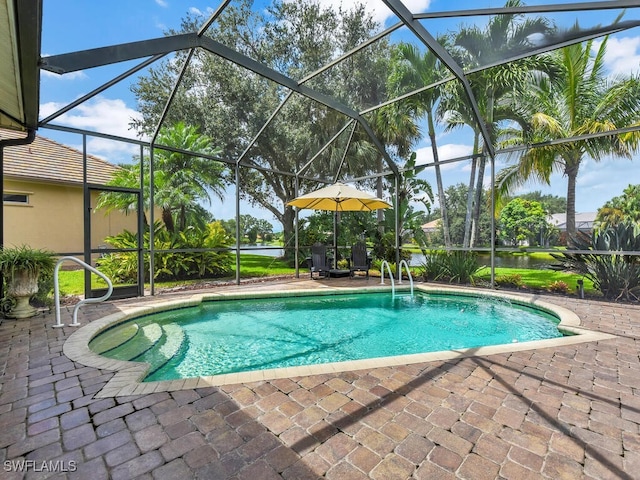 view of pool with a patio and a lanai