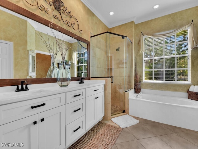 bathroom featuring vanity, separate shower and tub, crown molding, and a wealth of natural light