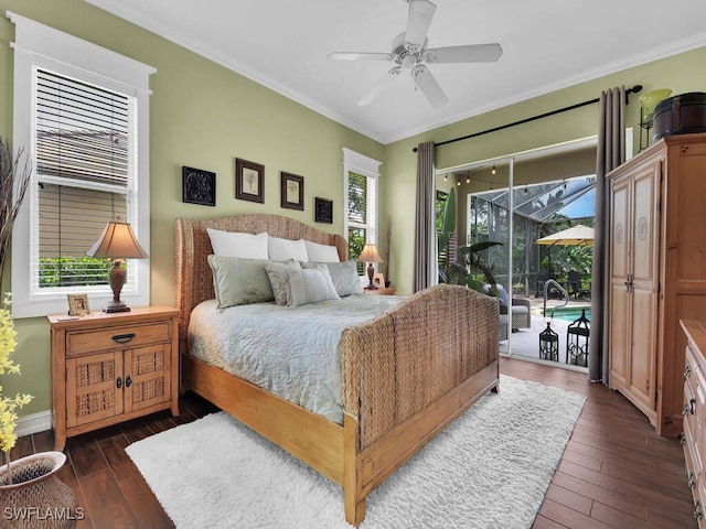 bedroom featuring access to outside, dark hardwood / wood-style floors, multiple windows, and ceiling fan