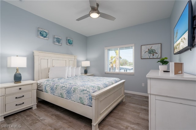 bedroom featuring light wood-type flooring and ceiling fan