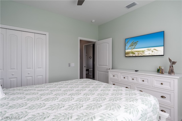 bedroom featuring ceiling fan and a closet