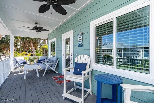 wooden terrace with ceiling fan