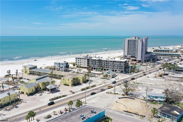 bird's eye view with a beach view and a water view