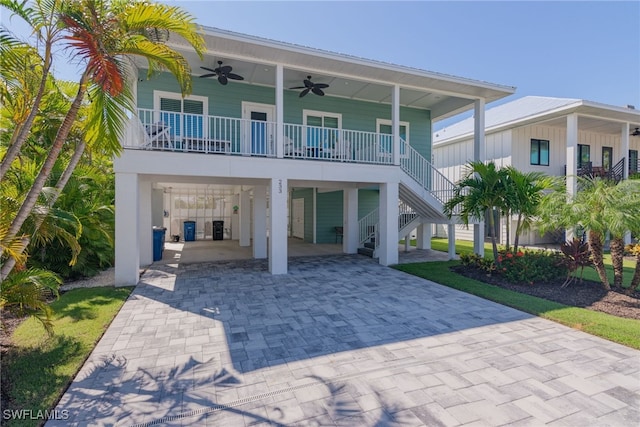 view of front of home featuring a porch and ceiling fan