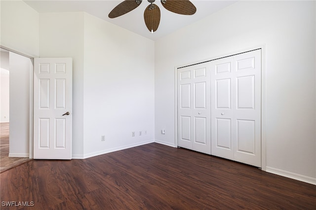 unfurnished bedroom with a closet, ceiling fan, and dark hardwood / wood-style floors