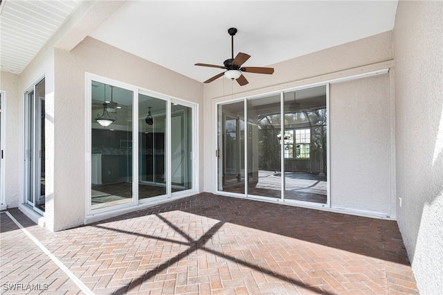 view of patio featuring ceiling fan