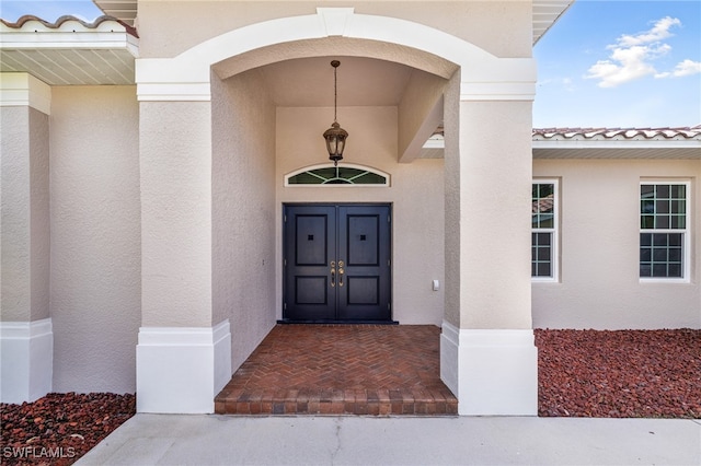 property entrance with covered porch