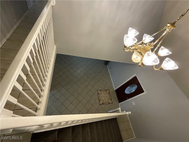 804 Yvonne Ave N, Lehigh Acres, FL 33971 - stairs with a chandelier