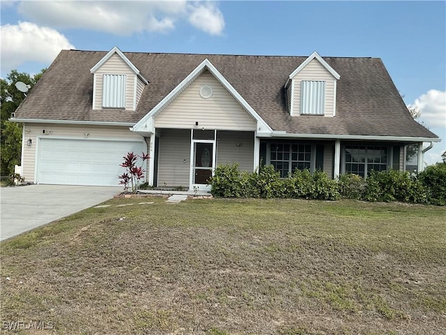 cape cod-style house with a front lawn, an attached garage, driveway, and roof with shingles