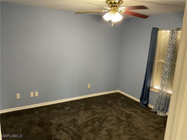 804 Yvonne Ave N, Lehigh Acres, FL 33971 - empty room with ceiling fan, dark carpet, and baseboards